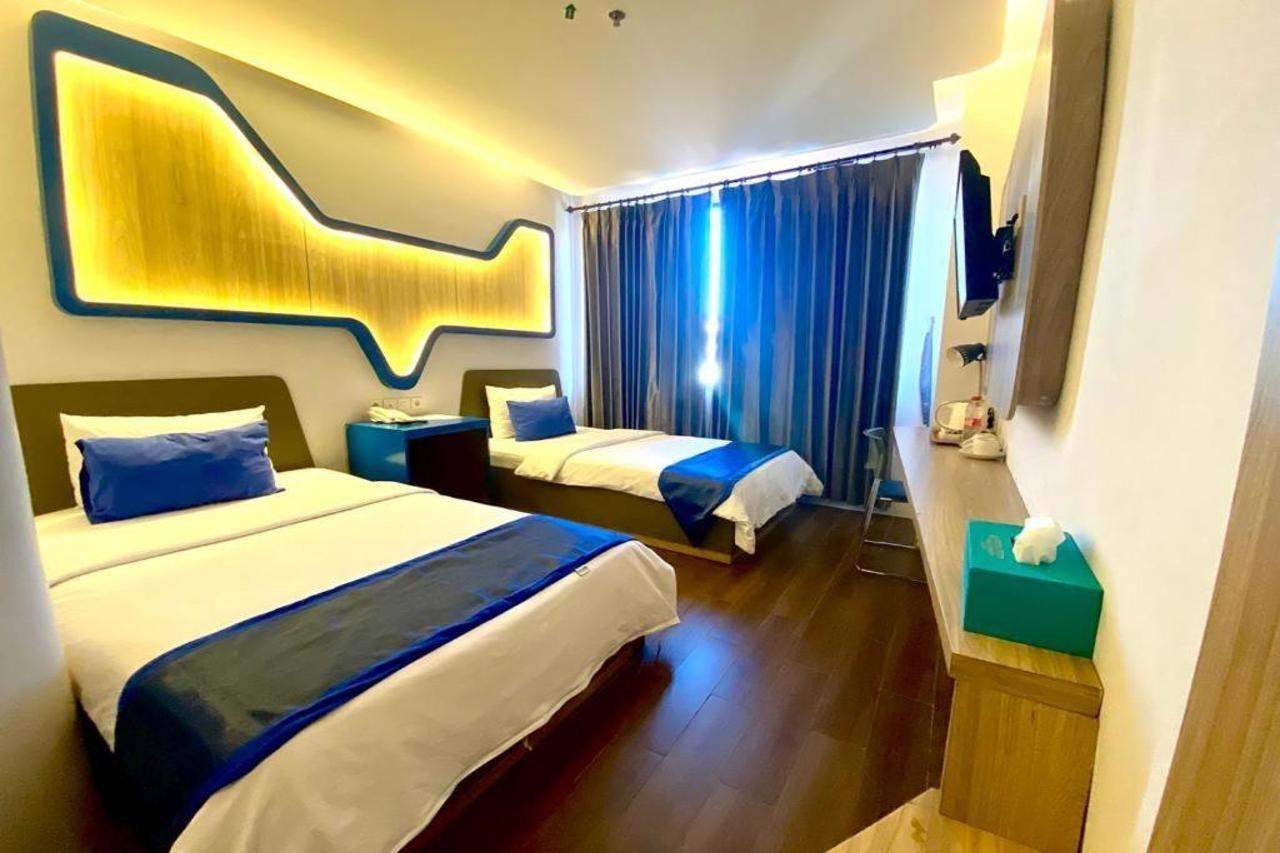 Golden Palace Hotel Batu Merah Extérieur photo